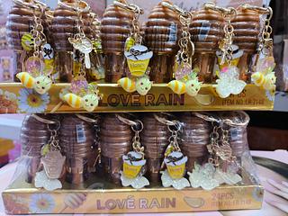 LR-7148 LIP GLOSS MEL COM CHAVEIRO LOVE RAIN 24UNIDADE